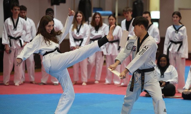 French college student smashes pine boards