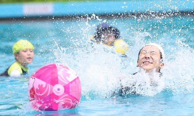 Swimming to beat the heat